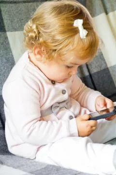 Cute infant with cellular Stock Photos
