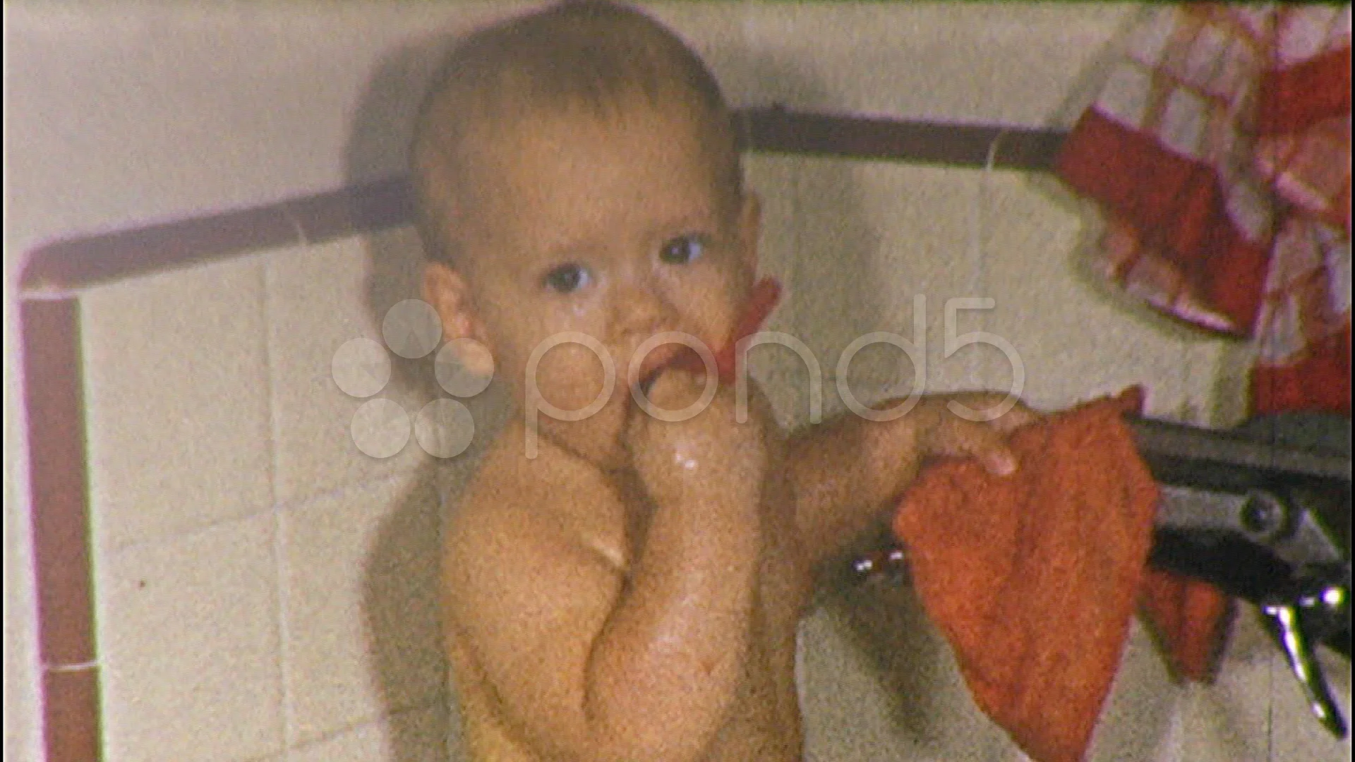 baby boy taking a bath