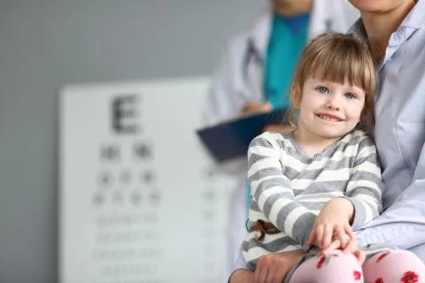 Cute kid looking at camera with gladness Stock Photos