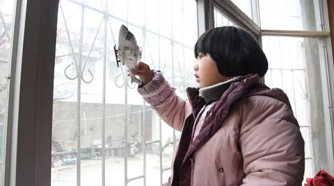 Cute kid playing with plane toy near the window at home Stock Footage 46603745