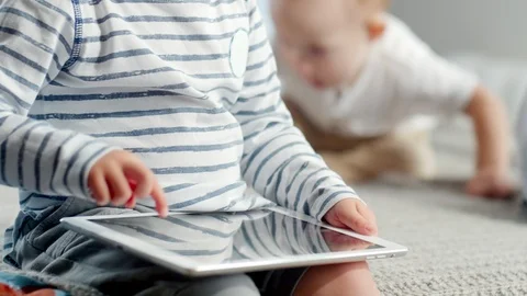 Cute Kid Playing on Tablet Stock Footage 101039294