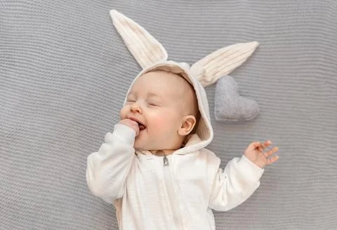 Cute kid in a rabbit costume. Easter concept Stock Photos