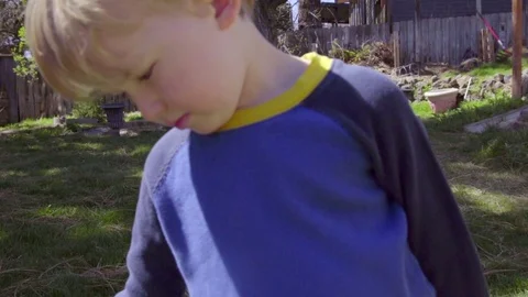Cute kid tries blow bubbles and smiles Stock Footage 75023722