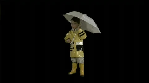 Cute kid with umbrella. Stock Footage 78859