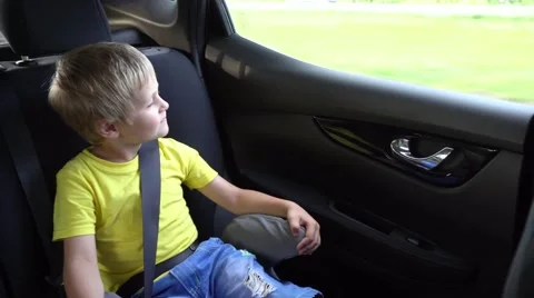 Cute kids going in car Stock Footage