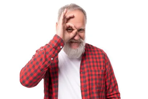 Cute kind friendly 60s elderly grandfather man with gray beard 스톡 사진