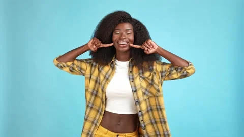 Cute lady point hand teeth modern restoration isolated blue color background Stock Footage 166158295