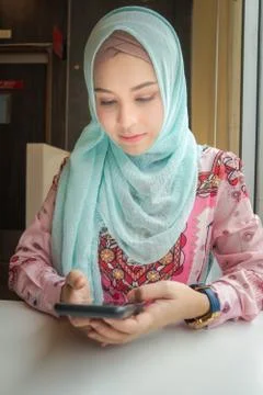 .cute lady using her mobile phone. Stock Photos