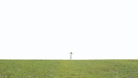 Cute lady walking through the meadow Stock Footage 95935879