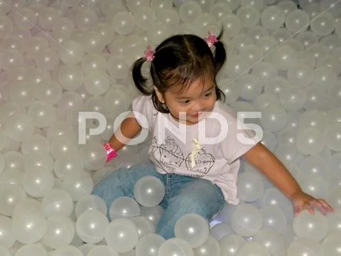 Cute little asian girl playing Stock Photos
