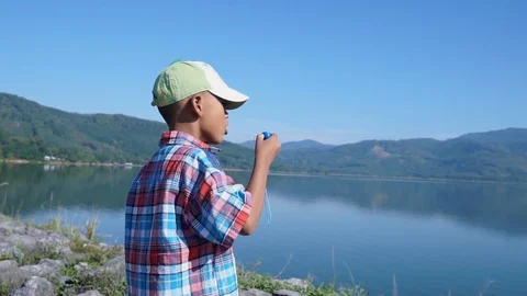Cute little boy blowing bubble soap Stock Footage 91877653
