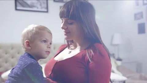 Cute little boy is cuddle to mum. FULL HD. slow motion Stock Footage 73963976