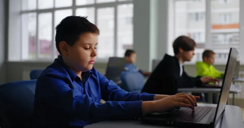 Cute Little Boy Learning Coding In IT Classes, Portrait Of School Student In Stock Footage 280176289