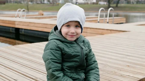 Cute Little boy looking at camera and smiling Stock Footage 106877957