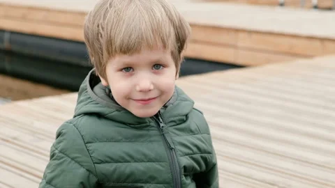 Cute Little boy looking at camera and smiling Stock-Footage 106879500