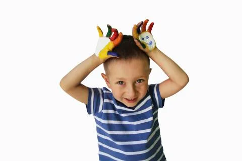 Cute little boy with painted hands Foto stock