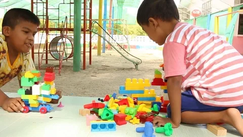 Cute little boy play block toy  at playground Stock Footage 73714647