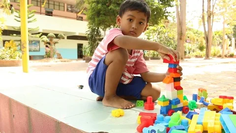 Cute little boy play block toy  at playground 動画素材 73715475