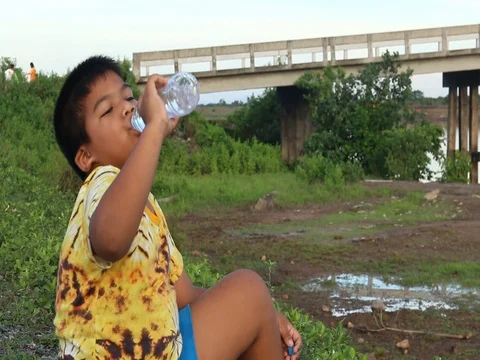 Cute little boy play bubble at river Stock Footage 73720896