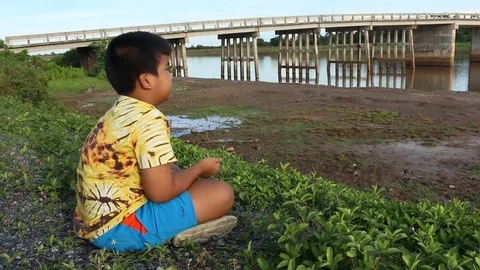 Cute little boy play bubble at river Stock Footage 73720957