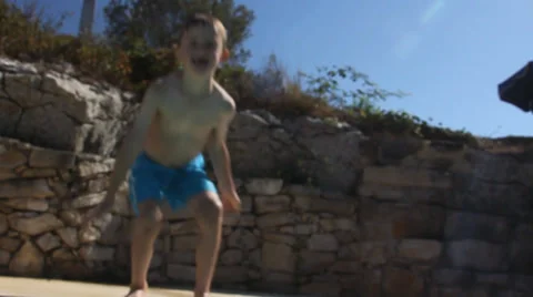 Cute little boy playing in the pool on summer vacation Stock-Footage 32936283