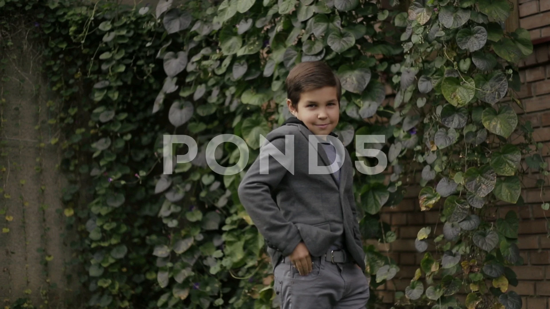 cute little boy poses camera footage 092436723 prevstill