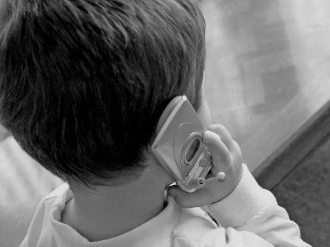 Cute little boy posing for camera Stock Photos