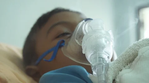 Cute little boy sick nebulizer Video stock 102405985