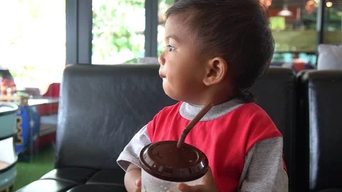 Cute little  boy suck ice Stock Footage 108682018