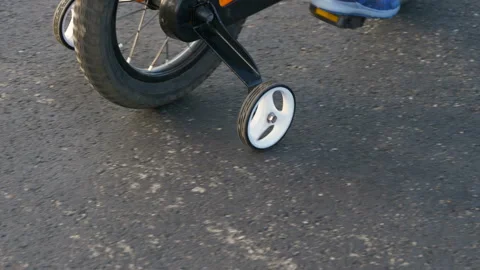 Cute little boy ( two years old child) is riding bike Stock Footage 113854237