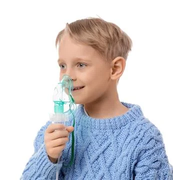 Cute little boy using nebulizer on white background Stock Photos