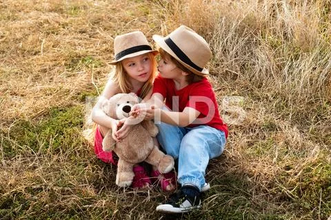 Cute little children enjoying on farm. American farm life. Happy children Stock Photos