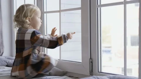 Cute little girl having fun on Christmas morning. Precious family moment, you Stock Footage