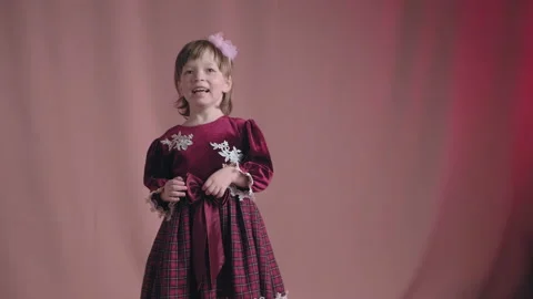 Cute little girl in an vintage burgundy Stock Video Pond5