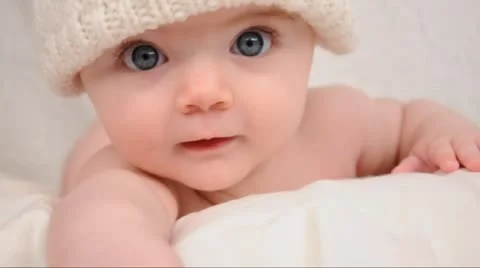 Cute Little Happy Baby with White Hat Stock Footage