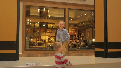 Cute little kid dancing at the mall. Stock Footage 76204573