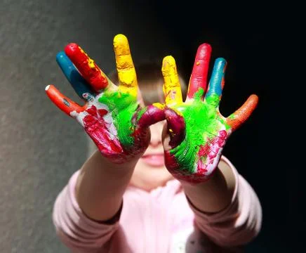 Cute little kid with painted hand Stock Photos