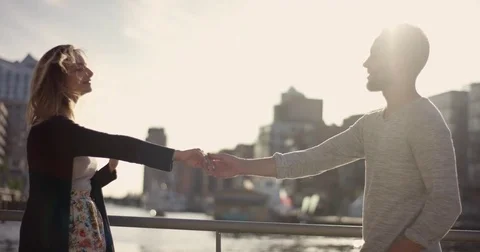 Cute Love Couple dancing in front of Port City Stock Footage 78988731