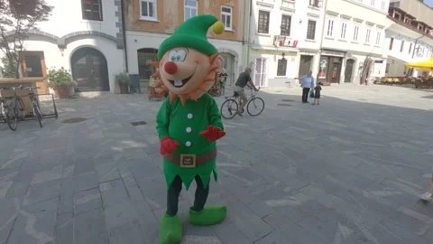Cute mascot dancing on the streets of old medieval town Kranj, Slovenia Stock Footage 152525278