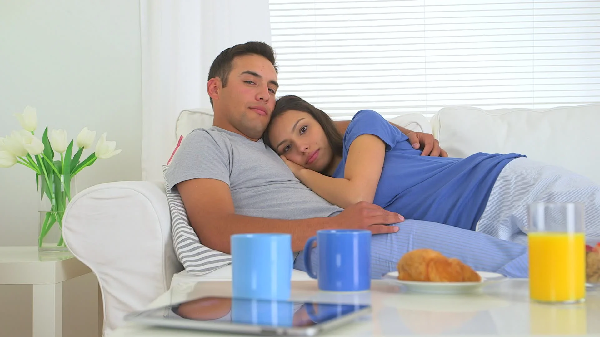 Cute Mexican Couple Cuddling On Couch Video 22795380