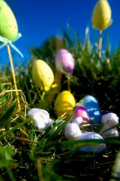 Cute Miniature Toy Easter Egg and Bunny Scene in the Grass Fotos Stock