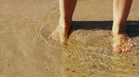 Cute mother and pretty lovely baby are having fun by the sea. Video stock 64037053
