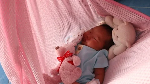 Cute new born sleeping Stock Footage 90968875