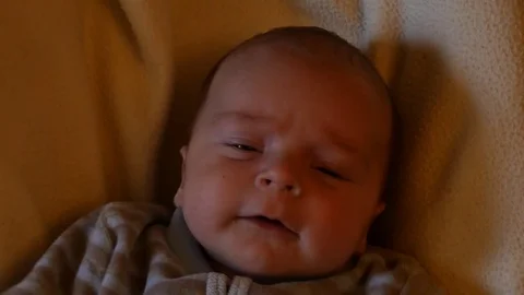 Cute newborn 7 weeks old baby boy opening the mouth Video stock 73131806