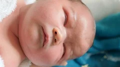 https://images.pond5.com/cute-newborn-baby-girl-gets-footage-089676606_iconm.jpeg