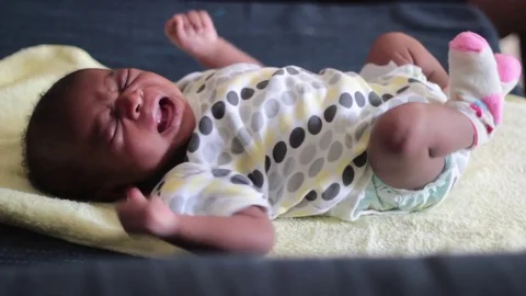 newborn baby girl crying