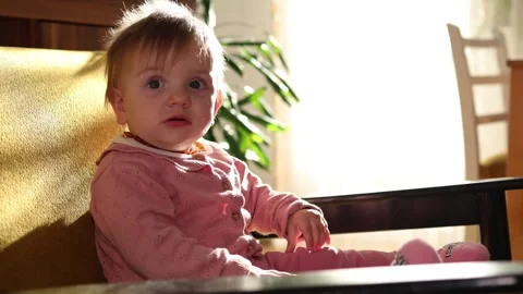 Cute one year old baby girl in living room. Stock Footage 301199033