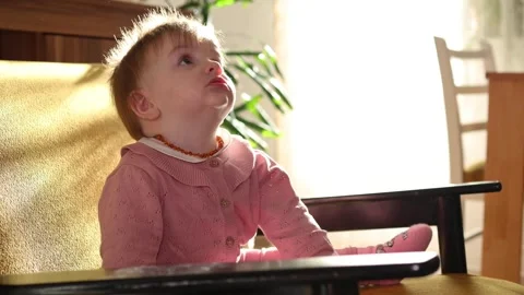 Cute one year old baby girl in living room. Stock Footage 301199504