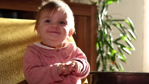 Cute one year old baby girl in living room. Stock Footage 301220314