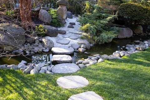 Cute path from white rocks in the park Stock Photos